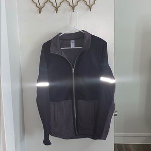Te Verde small purple jacket. Reflective